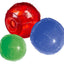 Three KONG dog toys in red, blue, and green on a white background