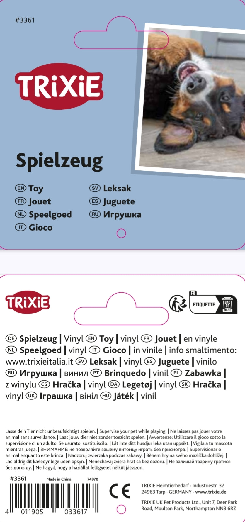 Trixie toy packaging with a dog playing with a toy on a light blue background