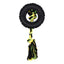 Dog toy with black tire and colorful rope on a white background