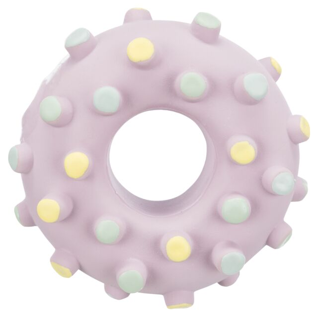 Purple donut-shaped dog toy with colorful bumps on a white background