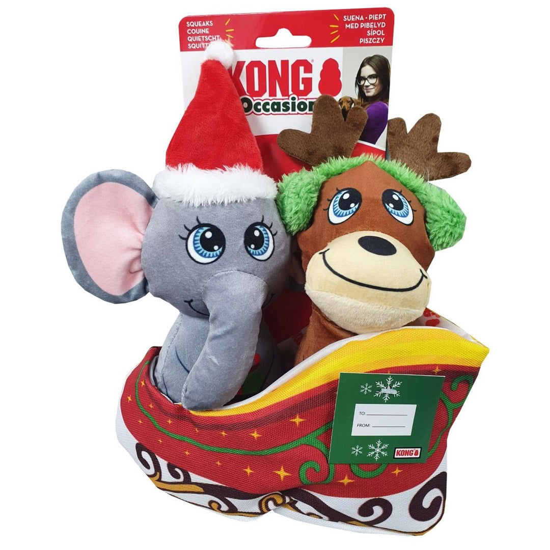 Two Christmas-themed plush toys, an elephant and a reindeer, in a decorative box with KONG branding.