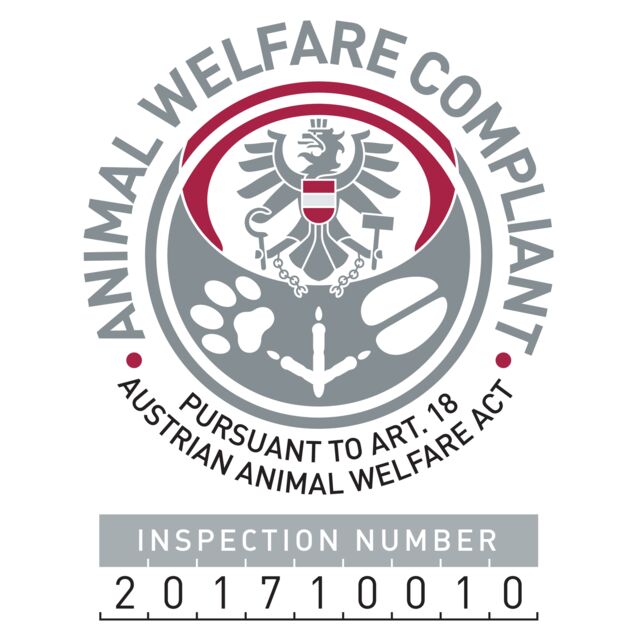 Animal welfare compliance logo with inspection number on a white background