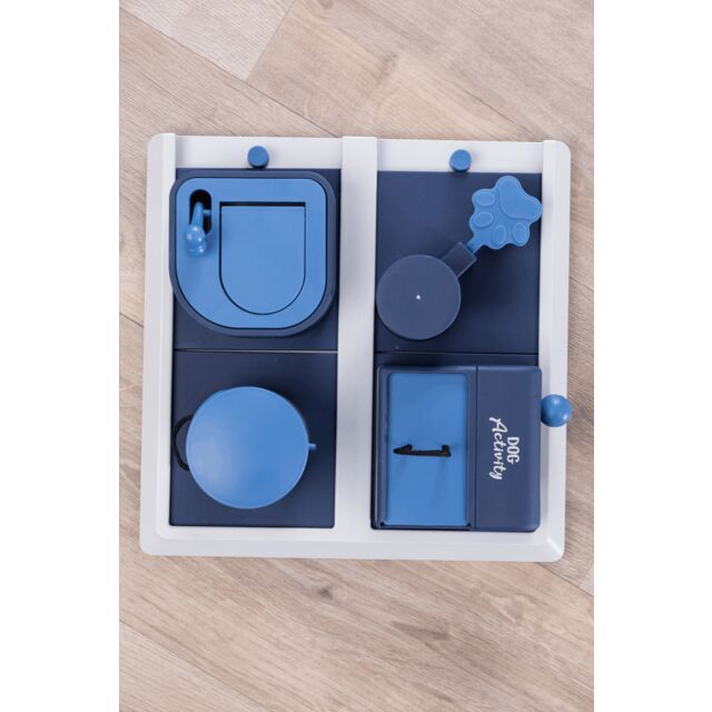 Top view of the four sections in an interactive dog toy. 