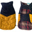 Two dog coats, one black and yellow, the other with plaid pattern, on a white background.