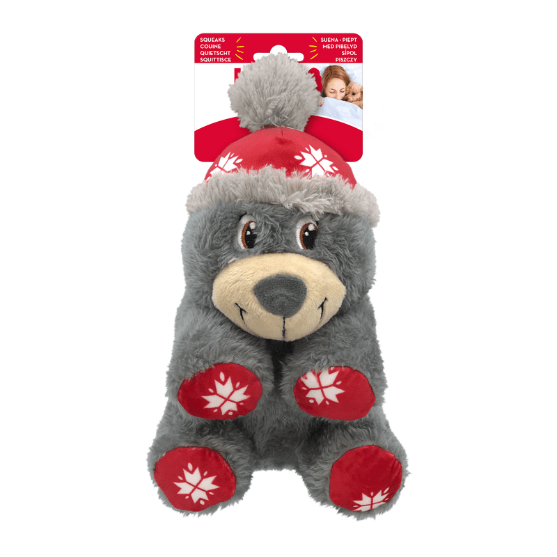 Plush dog toy bear with red hat and paws on a transparent background