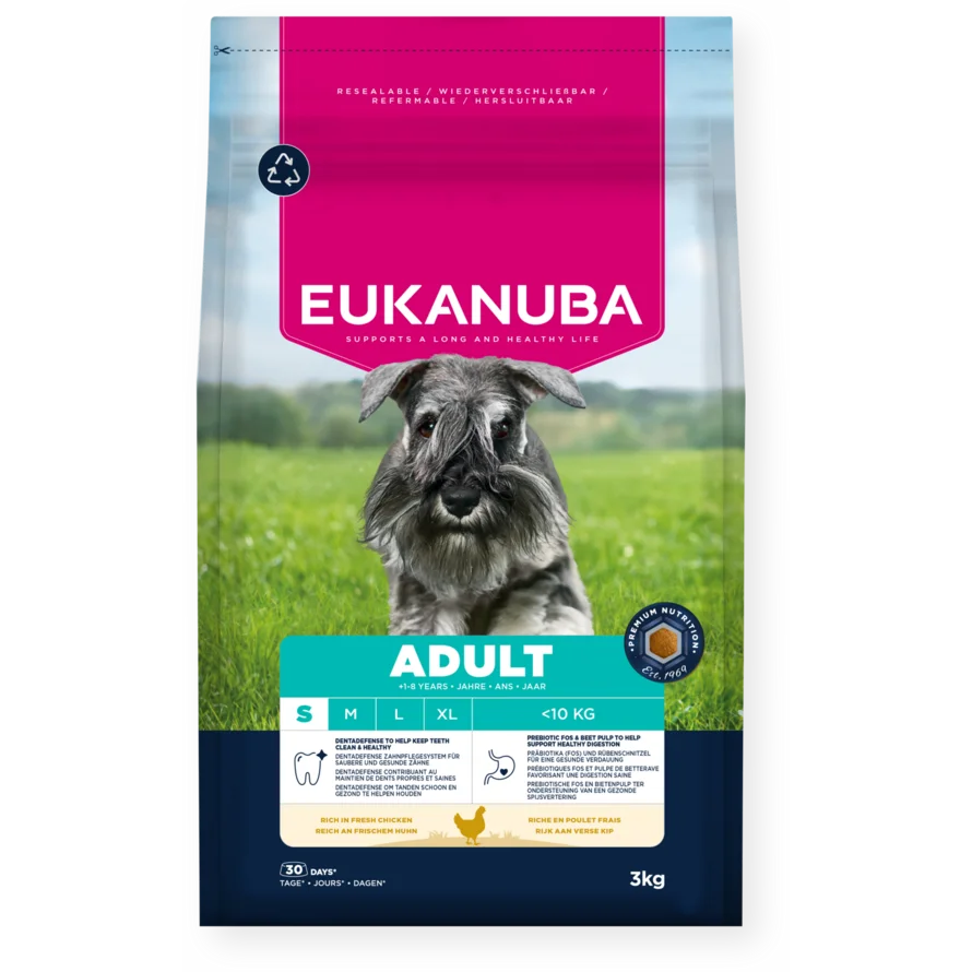 Eukanuba dog food package with a dog on a grassy background