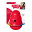 Red KONG Wobbler toy with packaging on a white background