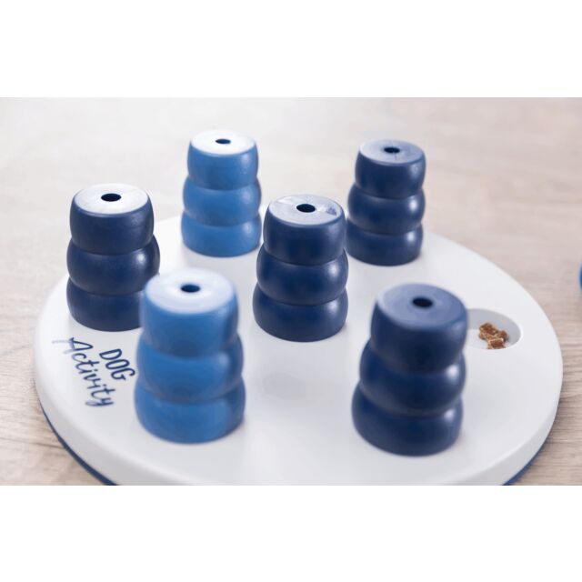 Blue and white dog activity toy on a white base