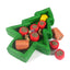 Small animal Christmas tree shaped treat with treats inside the tree