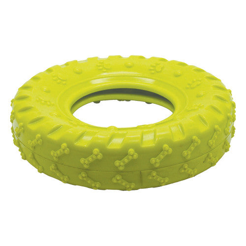 Yellow dog toy tire with textured surface on a white background
