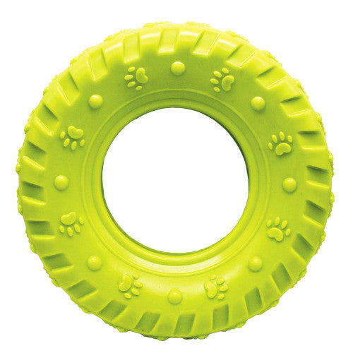 Green tire-shaped dog toy with paw prints on a white background