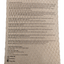 Textured product label with printed information on a beige background