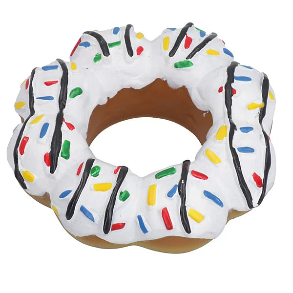 Donut-shaped dog toy with white icing, chocolate drizzle, and colorful sprinkles on a white background