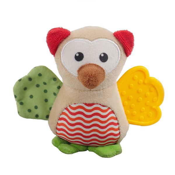 Plush owl dog toy with red ears, green wings, and a yellow patch on a white background