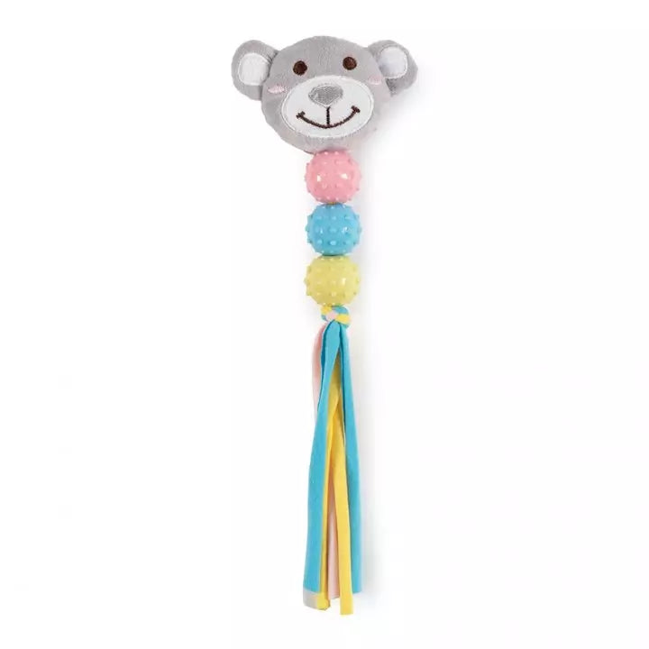 Puppy toy with a bear face and colorful body on a white background