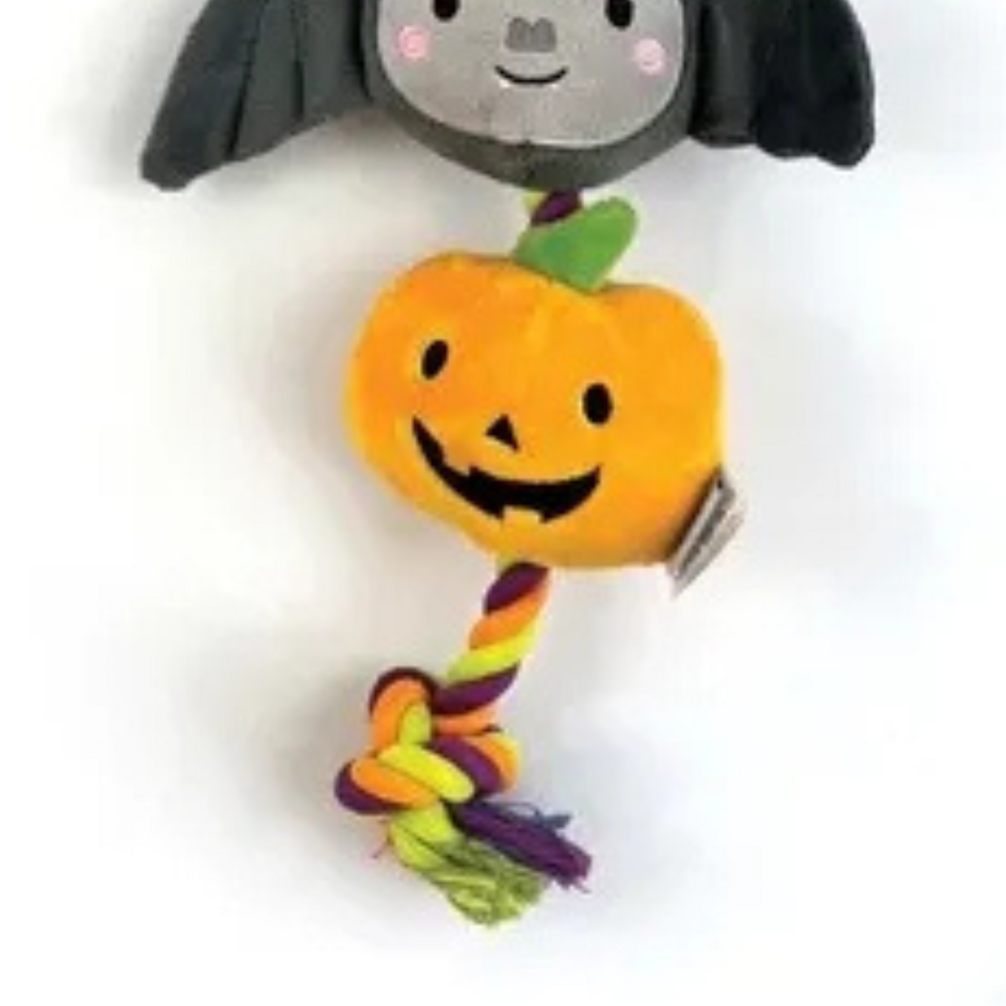 Halloween-themed plush dog toy with a bat and pumpkin on a white background