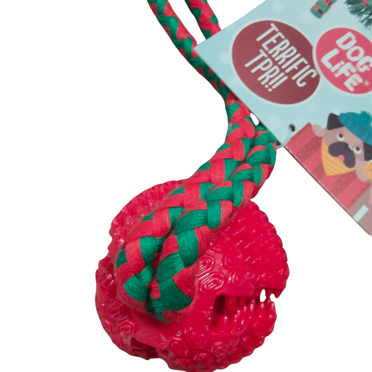Red dog toy with green braided rope and 'Dog Life' packaging in the background