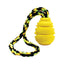 Yellow dog toy with black and green rope on a white background