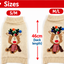 Size chart for a knitted pet sweater showing two size options: S/M and M/L. The sweaters are cream-colored with a festive reindeer design featuring a red nose, red-and-white striped scarf, and multicolored Christmas hat.