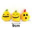 Three yellow plush pumpkin dog toys with different expressions on a white background, labeled '9cm'.
