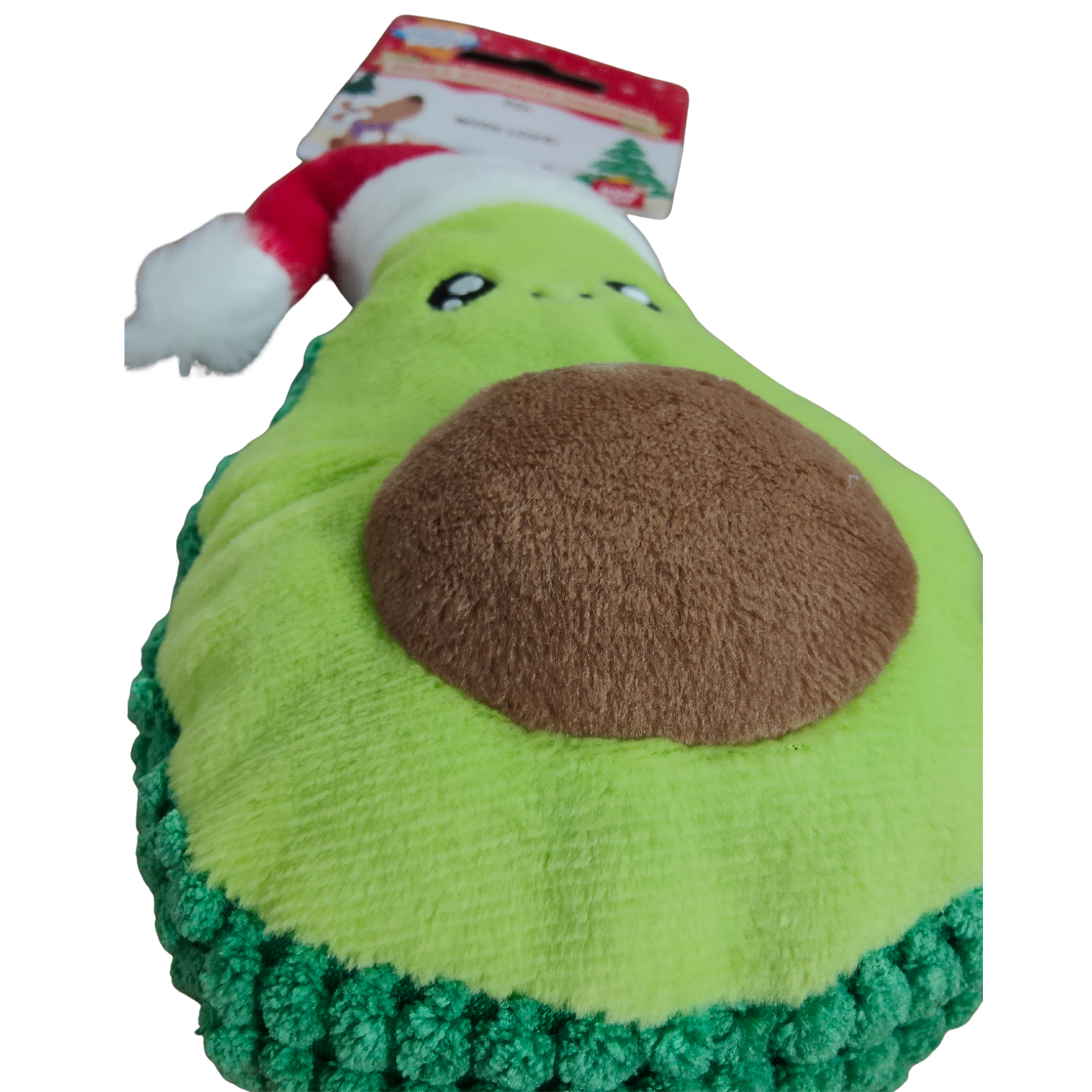 Plush avocado dog toy with a face on a white background