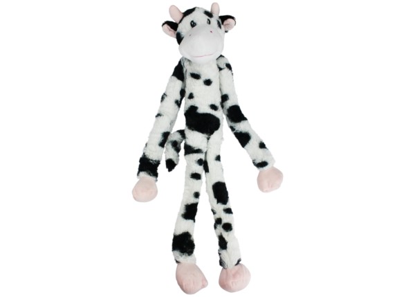 Plush cow dog toy with black and white pattern on a white background