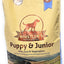 Whistler's Puppy & Junior dog food bag with images of dogs and a scenic background.