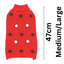 Red dog sweater with black and white polka dots on a white background, showing measurements for medium/large size.