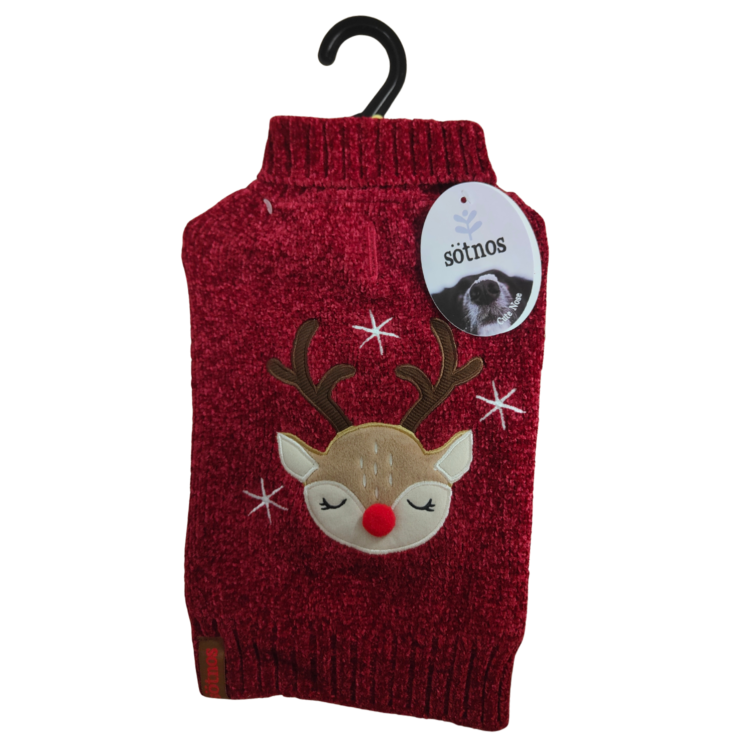 Red dog sweater with reindeer design on a hanger against a white background