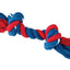 Red and blue braided dog toy on a white background