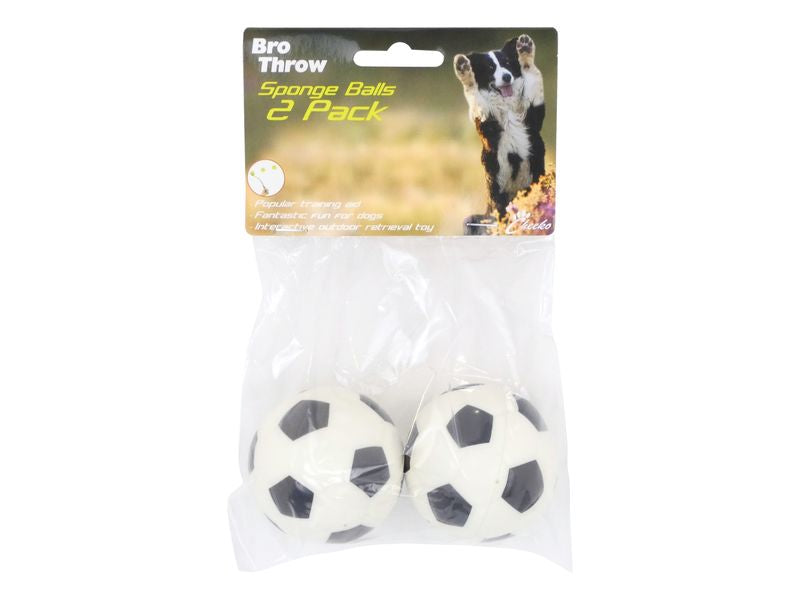 Packaged dog toy with two sponge balls and packaging showing a dog and text.